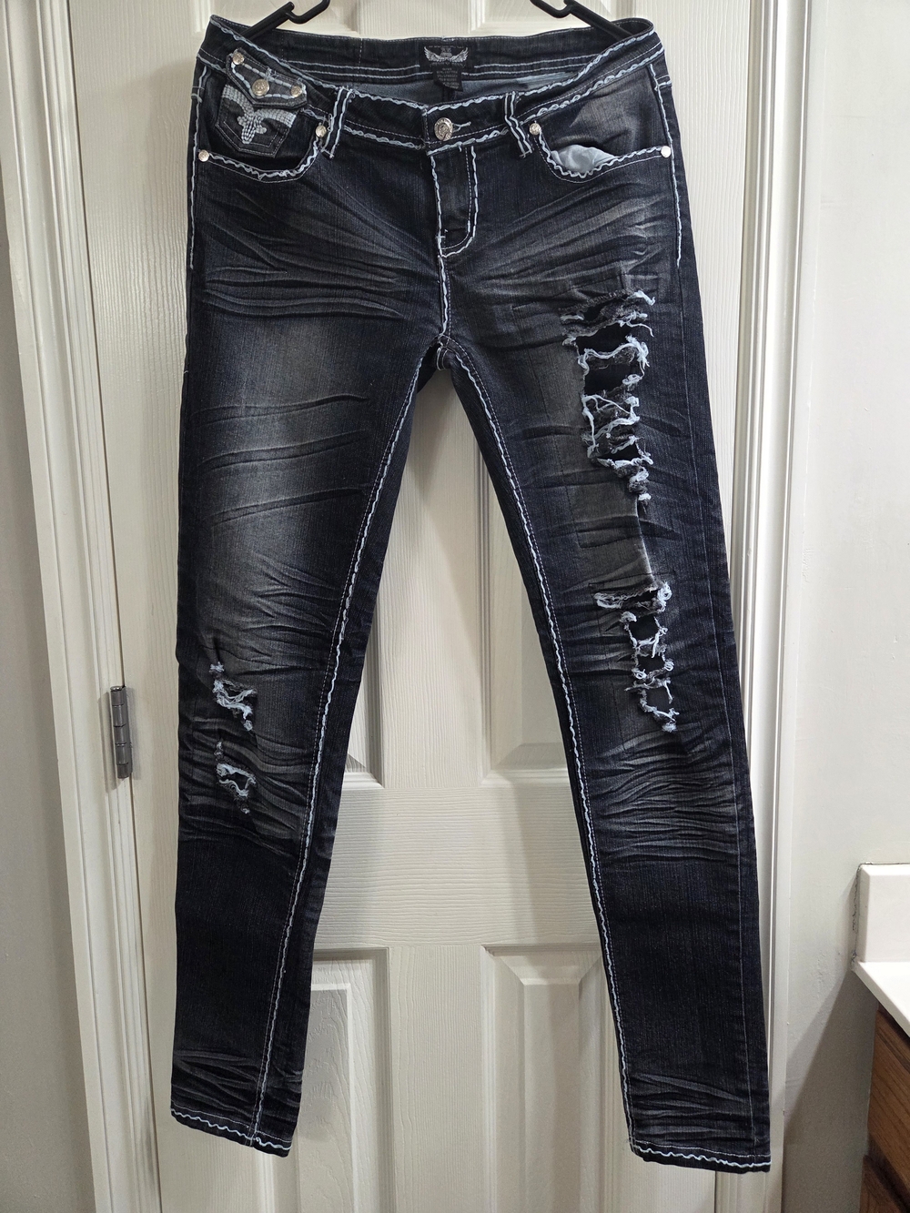 Women’s Black Distressed Skinny Jeans with White Contrast Stitching